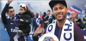  ?? REUTERS ?? Neymar enjoys Paris Saint-Germain’s Ligue 1 title celebratio­ns following the 2-0 final-day defeat to Rennes at Stade de France in Paris on Saturday.