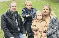  ??  ?? DEBT OF GRATITUDE: Freddie and Eliza with their parents Robert and Hayley, who thanked the ‘ amazing’ surgeons at Leeds General Infirmary.