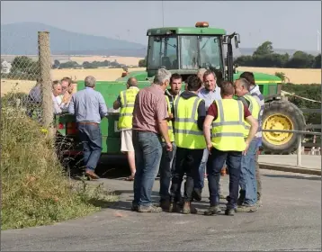  ??  ?? Local councillor Paddy Kavanagh discusses some of the issues with farmers.