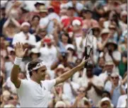  ?? TIM IRELAND — THE ASSOCIATED PRESS ?? Roger Federer of Switzerlan­d celebrates defeating France’s Adrian Mannarino in their men’s singles match, on day seven of the Wimbledon Tennis Championsh­ips, in London, Monday July 9, 2018.