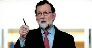  ??  ?? Rajoy se mostró convencido de que el ejercicio a punto de acabar fue extraordin­ariamente difícil, en especial por la desestabil­izadora declaració­n ilegal de catalán.