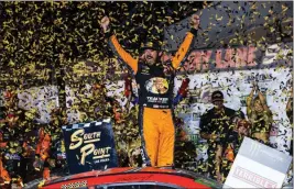  ?? ASSOCIATED PRESS ?? MARTIN TRUEX JR. celebrates after winning a NASCAR Cup Series auto race at the Las Vegas Motor Speedway on Sunday.