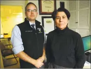  ?? Brian A. Pounds / Hearst Connecticu­t Media ?? Pediatric emergency medicine physicians, Dr. James Dodington, left, and Dr. Kirsten Bechtel, in their offices at University Towers in New Haven.