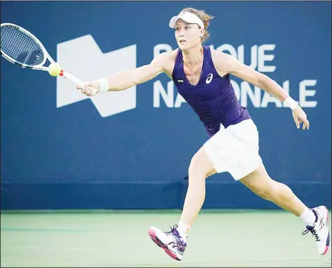  ??  ?? Samantha Stosur, of Australia, lunges for the return to Heather Watson, of Britain, during their first round match at the Rogers Cup tennis tournament in Montreal,
Monday, on July 25. (AP)