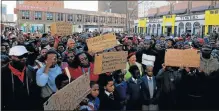  ?? Picture: FREDLIN ADRIAAN ?? SEEKING SOLUTIONS: Protesters gather outside City Hall to hand over a memorandum to the Department of Transport