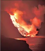  ?? ?? Lava from a volcano reaches the sea on the Canary island of La Palma, Spain, in the early hours of Wednesday.