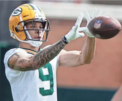  ?? ASSOCIATED PRESS ?? Green Bay Packers rookie receiver Christian Watson must show he has good hands.