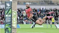  ?? ?? FLYING THROUGH: Edwill van der Merwe of the Lions dives over to score their third try in the United Rugby Championsh­ip match against Connacht in Galway, Ireland, on Saturday