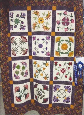 ?? Photo by Danette Russell/LeFlore Co. Oklahoma State University Extension Office ?? This was the champion quilt from the 2021 LeFlore County Quilt Show. This year’s event will be from 9 a.m. to 4 p.m. June 3-4 at Kiamichi Tech.