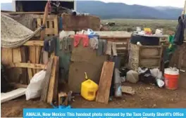  ?? — AFP ?? AMALIA, New Mexico: This handout photo released by the Taos County Sheriff’s Office on August 4, 2018 shows a view of a makeshift compound.