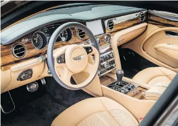  ?? BENTLEY ?? Four-hundred man hours go into the production of each 2017 Bentley Mulsanne, which features 480 leather parts cut from 24 hides, 12 veneers and, naturally, a champagne fridge.