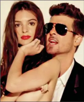  ??  ?? Controvers­ial: Robin Thicke in the video for his hit Blurred Lines