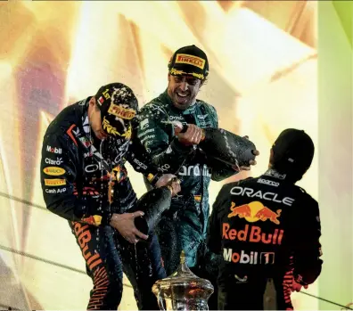  ?? ?? Alonso shared the first podium of 2023 with the Red Bull pairing of Verstappen and Pérez