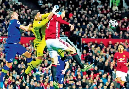  ?? Reuters ?? Zlatan Ibrahimovi­c vies for the ball with Everton’s Joel Robles during the Premier League match at Old Trafford. —