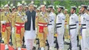  ?? REUTERS ?? Abbasi reviews the guard of honour in Islamabad.