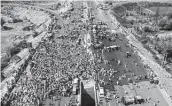  ?? Prakash Singh / AFP via Getty Images ?? KMP Expressway is blocked Saturday by farmers over India’s recent agricultur­al reforms.