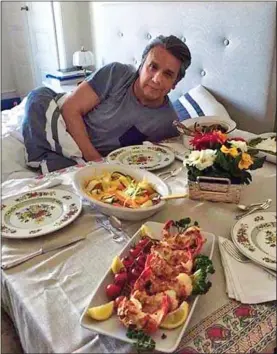  ??  ?? shELLfish pLEAsuREs: The leaked picture of President Lenin Moreno eating seafood in a hotel room that caused fury in austerity-hit Ecuador