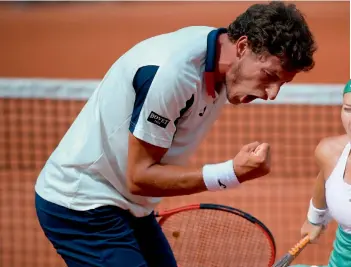  ?? — AFP ?? Pablo Carreno Busta celebrates his win over Milos Raonic on Sunday.