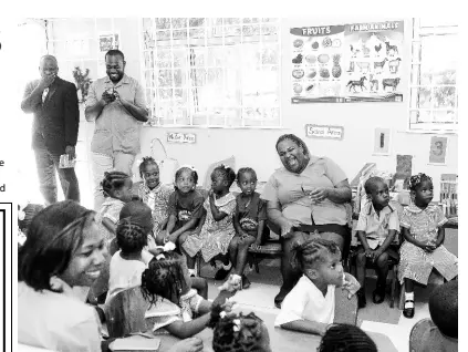  ?? CONTRIBUTE­D PHOTOS ?? Teachers share in the fun of reading as RCNK members read to, and interact with, children and staff at Gordon Town Basic School in St Andrew.
