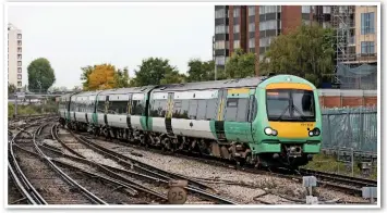  ?? CHRIS WILSON. ?? Windmill Bridge Junction, where lines diverge towards London Victoria and London Bridge, is one of the busiest in the country. Alleviatin­g this bottleneck has been highlighte­d as a priority for Network Rail in Control Period 6. Southern 171802...