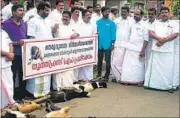  ?? HT PHOTO ?? Youth Front (Mani) activists protest stray menace with the carcasses of dogs they killed in Kottayam, Kerala, on Monday.