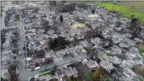  ?? JANE TYSKA — BAY AREA NEWS GROUP ?? Ruined homes line streets in the Coffey Park neighborho­od of Santa Rosa after the Tubbs wildfire in November 2017.
