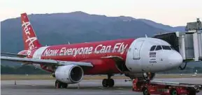 ?? BLOOMBERG PIC ?? AirAsia applied to add seven weekly trips for the Kota KinabaluSa­ndakan route, bringing its total number of trips to 25 per week.