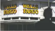  ?? PATRICK T. FALLON / BLOOMBERG FILES ?? Already having a bad year because of scandals, Wells Fargo is now suffering because of the pandemic and expects to have to set aside more money for bad loans.