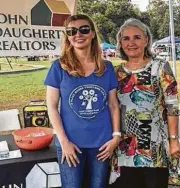  ??  ?? Caroline O’Reardon and Ellen Wenske of John Daugherty, Realtors manned a booth at a recent Oak Forest event.