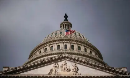  ??  ?? The US Capitol, under threatenin­g clouds. Photograph: Alex Edelman/AFP via Getty Images