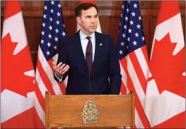  ?? Canadian Press photo ?? Finance Minister Bill Morneau speaks during a joint media conference with United States Secretary of the Treasury Steven Mnuchin on Parliament Hill in Ottawa on Friday.