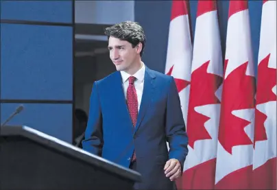  ?? CP PHOTO ?? Prime Minister Justin Trudeau arrives to hold a press conference at the National Press Theatre in Ottawa on Tuesday.