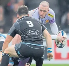  ??  ?? Former Glasgow star Stuart Hogg is put under pressure by his old mates yesterday