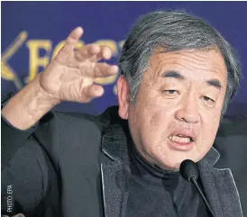  ??  ?? Current Olympic architect Kengo Kuma speaks at a press conference yesterday.