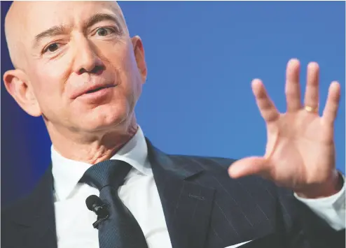  ?? JIM WATSON / AFP / GETTY IMAGES FILES ?? “If you do it right,” Jeff Bezos said in an earning release Tuesday, “a few years after a surprising invention, the new
thing has become normal. People yawn. That yawn is the greatest compliment an inventor can receive.”