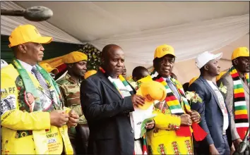  ??  ?? President Mnangagwa flanked by Vice Presidents Constantin­o Chiwenga (left) and Kembo Mohadi (far right), Youth Affairs secretary Pupurai Togarepi (second from left) and his deputy Lewis Matutu at the ZANU-PF Youth League Convention