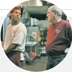  ??  ?? Shane Paul McGhie (left) and Richard Jenkins work at a grubby Michigan fast-food joint in “The Last Shift.”