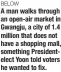  ?? ?? BELOW
A man walks through an open-air market in Gwangju, a city of 1.4 million that does not have a shopping mall, something Presidente­lect Yoon told voters he wanted to fix.