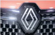  ?? AFP ?? The Renault logo is seen on a car at the Paris Motor Show in October.