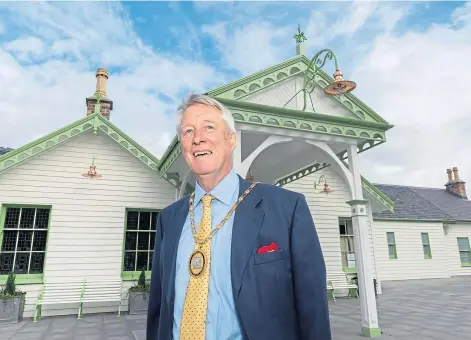  ?? ?? THROW OFF THE CHAIN: Bill Howatson at the unveiling of the renovated Ballater Station and, right, at home in St Cyrus where he plans to still be involved in the community.