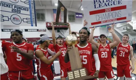  ?? AP FILe PhOTOs ?? TITLE DEFENSE: Boston University’s Jonas Harper clutches the trophy after the Terriers beat Colgate in the Patriot League championsh­ip game at Cotterell Court in Hamilton, N.Y., on March 11. Below, Walter Whyte celebrates with head coach Joe Jones.