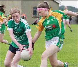  ??  ?? Ava Kelly of Crossabeg-Ballymurn tussling with Clonee’s Lorna Fortune.