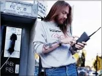  ?? Mark Weiss photo ?? Axl Rose of Guns N’ Roses in 1988.