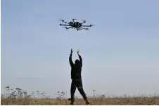  ?? — AFP file photo by Genya Savilov ?? A pilot practices with a drone on a training ground in Kyiv region, amid the Russian invasion of Ukraine.