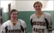  ?? CHRIS LILLSTRUNG — THE NEWS-HERALD ?? Brush’s Alex Miller, left, and Nick Iacobucci are part of a new-look Arcs team this winter that graduated eight seniors and strives to honor former teammate Alec Kornet.