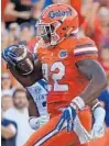  ?? MIKE EHRMANN/GETTY ?? UF running back Lamical Perine has led the Gators in rushing and touchdowns scored the last two seasons.