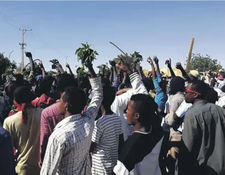  ?? AP ?? Protesters voice their grievances against President Omar Al Bashir on Sunday during an anti-government rally in Kordofan