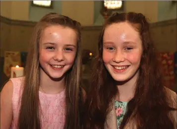  ??  ?? Shauna Donoghue with Aisling Kenny at the Confirmati­on ceremony in St Patrick’s Church, Craanford.