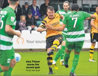  ?? Picture: Steve Terrell ?? Alex Flisher scores the second goal