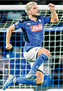  ?? AFP ?? Napoli’s Belgian forward Dries Mertens celebrates after scoring a penalty against Liverpool during their UEFA Champions League match at the San Paolo stadium in Naples on Tuesday. Napoli won 2-0. —